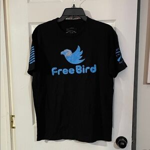 Grunt Style Black Tee with Blue FreeBird Graphic. Size L